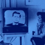 image of family watching JFK on the television