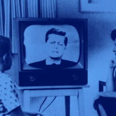 image of family watching JFK on the television
