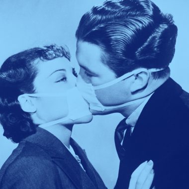 man and woman with masks on and kissing, blue filter