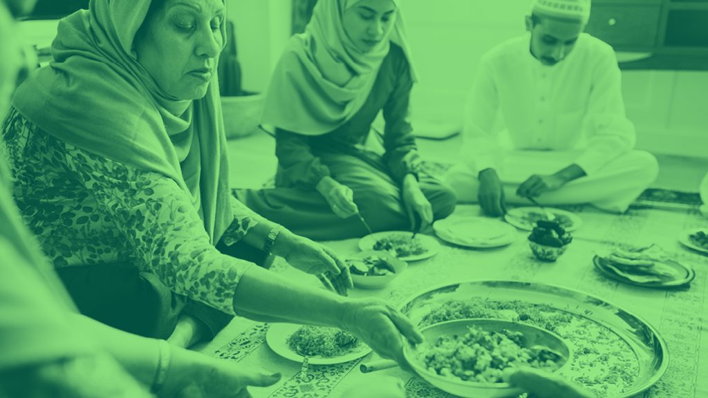 people gathered for a feast, green filter