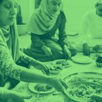 people gathered for a feast, green filter