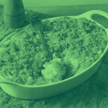 mashed potatoes in serving dish, green filter.