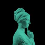 Side view of plaster sculpture of woman from ancient Greece.