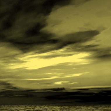 sunset with cloudy sky, yellow filter