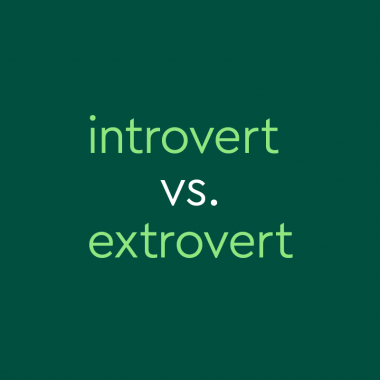 Dark green background with light green text: "introvert vs. extrovert"
