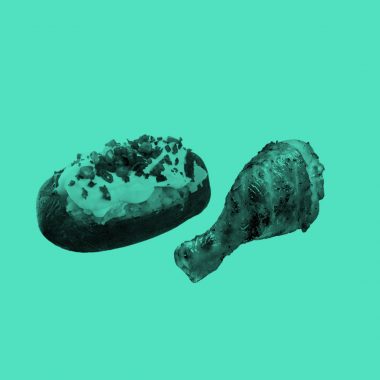 teal filtered image of a baked potato with sour cream, bacon bits, and chives, and a chicken drumstick, on a light teal background.