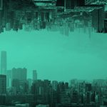 image of a cityscape reflected upon itself, in teal filter.