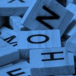 assorted scrabble tiles, in blue filter.