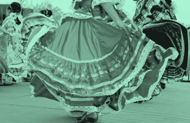 women dancing in colorful skirts