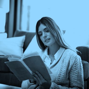 woman reading book, blue filter