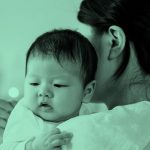 mom burping baby, green filter