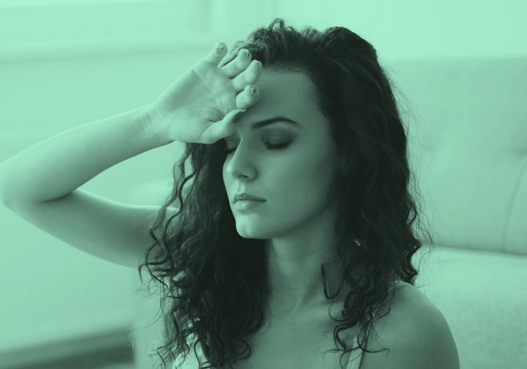 woman fainting, lightheaded, blue green filter