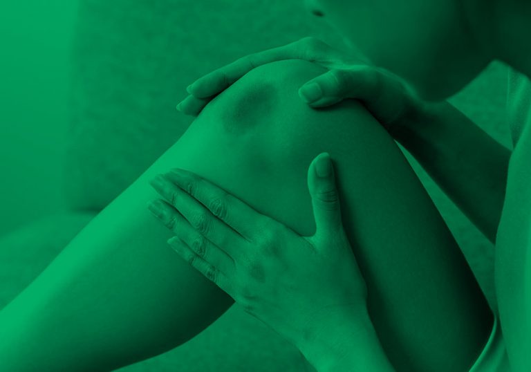 bruise on knee; green filter