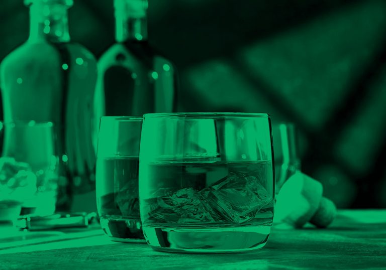 whiskey and glasses; green filter