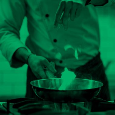 person cooking; green filter