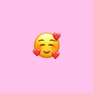 face with 3 hearts emoji; pink background
