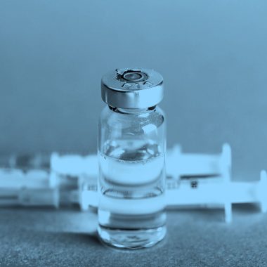 vial and syringe; blue filter