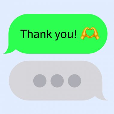 text message saying thank you with heart hands emoji